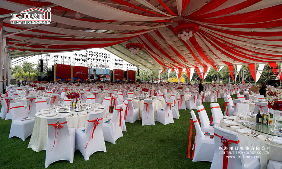 Luxury interior decoration inside a modular wedding tent with elegant linings and lighting