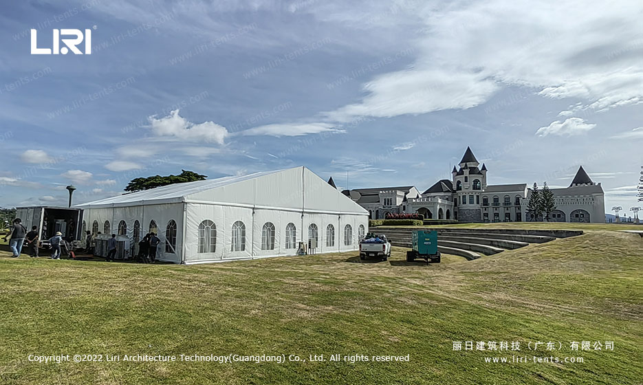 white 30x30 wedding marquee on lawn