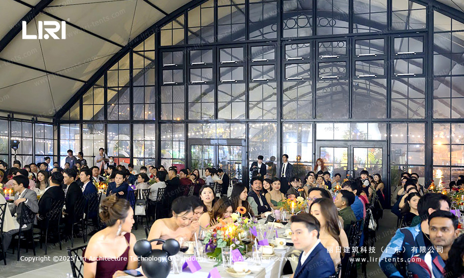 Modular wedding tent reception with guests inside