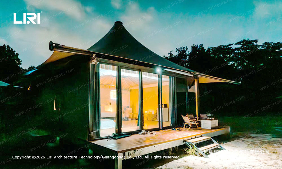 Glamping suite interior king bed draped ceiling — luxury safari tent resort accommodation, modern furnishings, Indian tipi