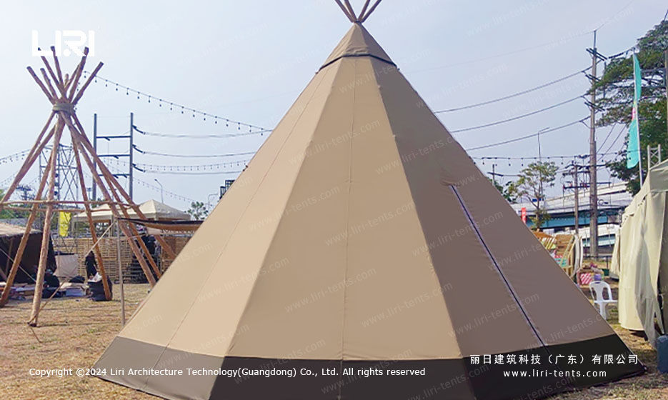 Tipi tent wedding venue for outdoor celebrations. Conical canvas shelter seats 80-120 guests, handles wind and rain, works for receptions, markets and multi-day events.