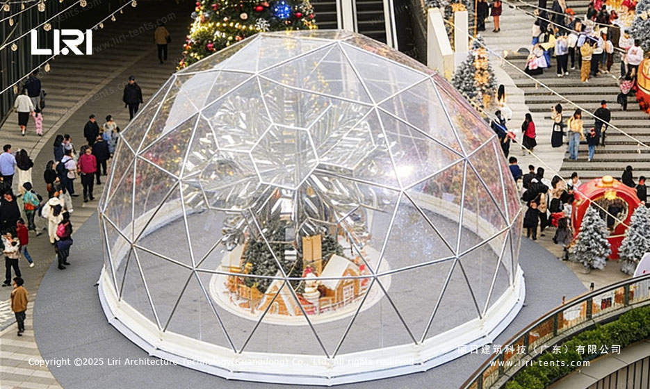 Large geodesic dome tent overview in a busy outdoor venue