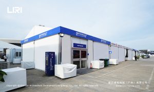 ABS hard wall service pavilion with Formula E branding and blue accents