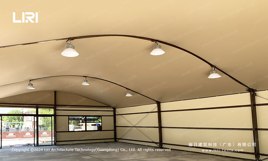 Arc top tent ceiling with interior lighting