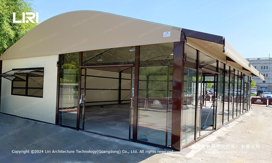 Completed arc top tent exterior with glass walls