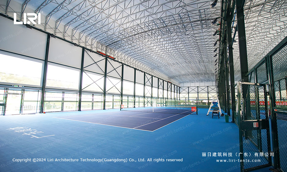 indoor tennis court covered by clear span wedding tent