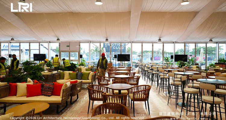 Luxury wedding marquee lounge with draped fabric ceiling