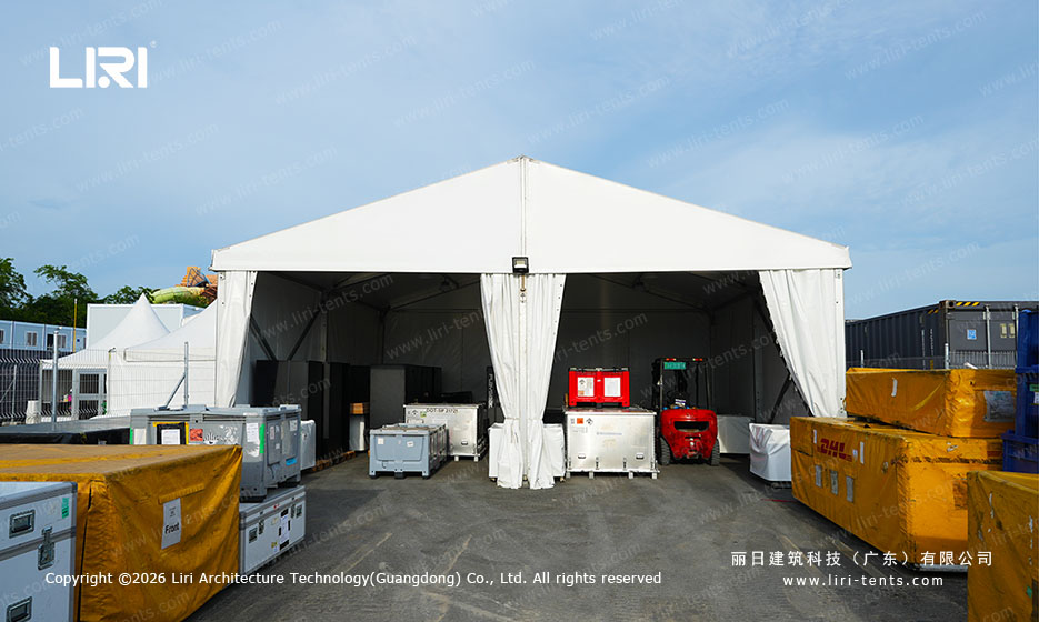 White PVC sports warehouse tent with red equipment carts